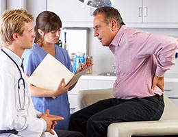 Blog_10ReasonsYourUrgentCareMayNotBeSafe_MedProfExamBackPainGeriatricMale_260x200px.jpg